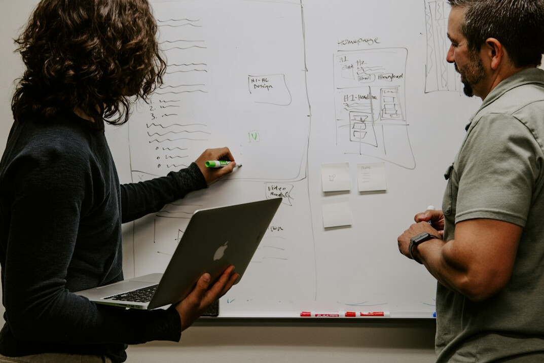 researchers reviewing charts