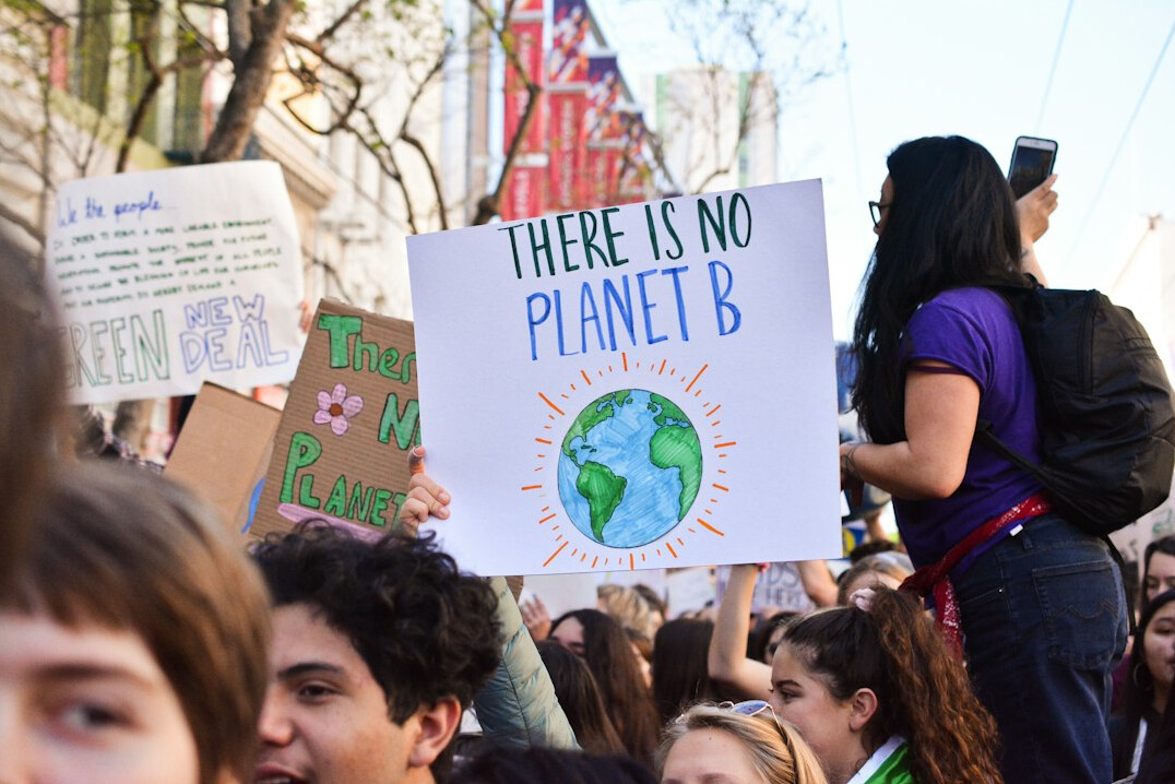 diverse group protesting for environment